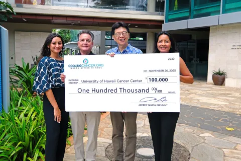 Cooling Cancer donation check presentation archive photo